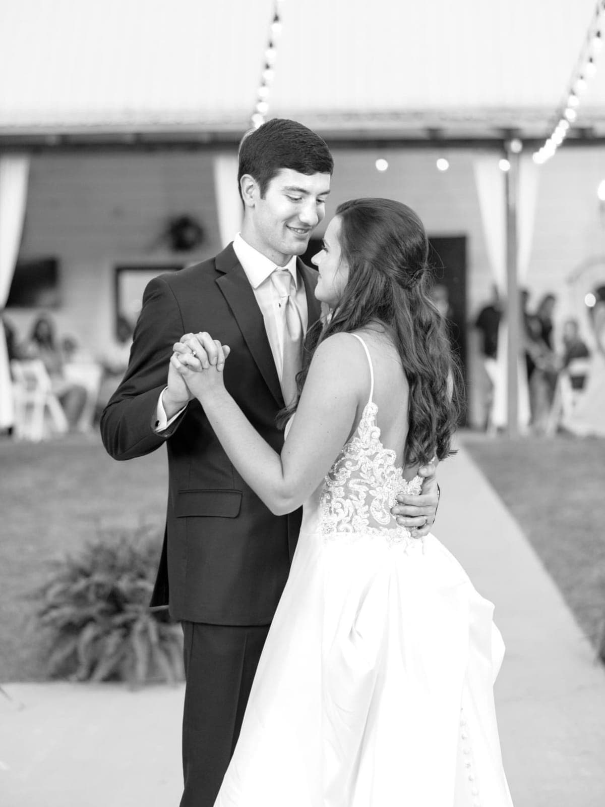 Justin and his wife sharing their first dance at their wedding